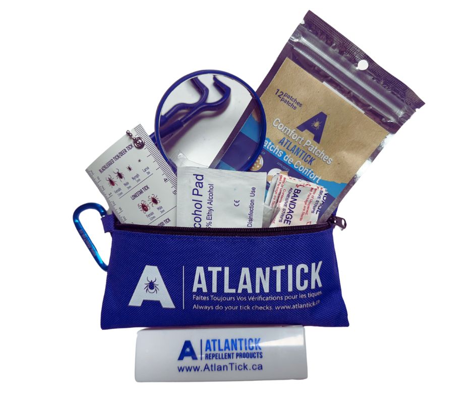 A compact AtlanTick Tick Kit in a blue zippered pouch with a carabiner clip, filled with essential tick removal and care tools, including a magnifying glass, tick ID card, alcohol pads, bandages, Comfort Patches, and tick removers. Designed for safe tick removal and post-bite relief for humans and pets.