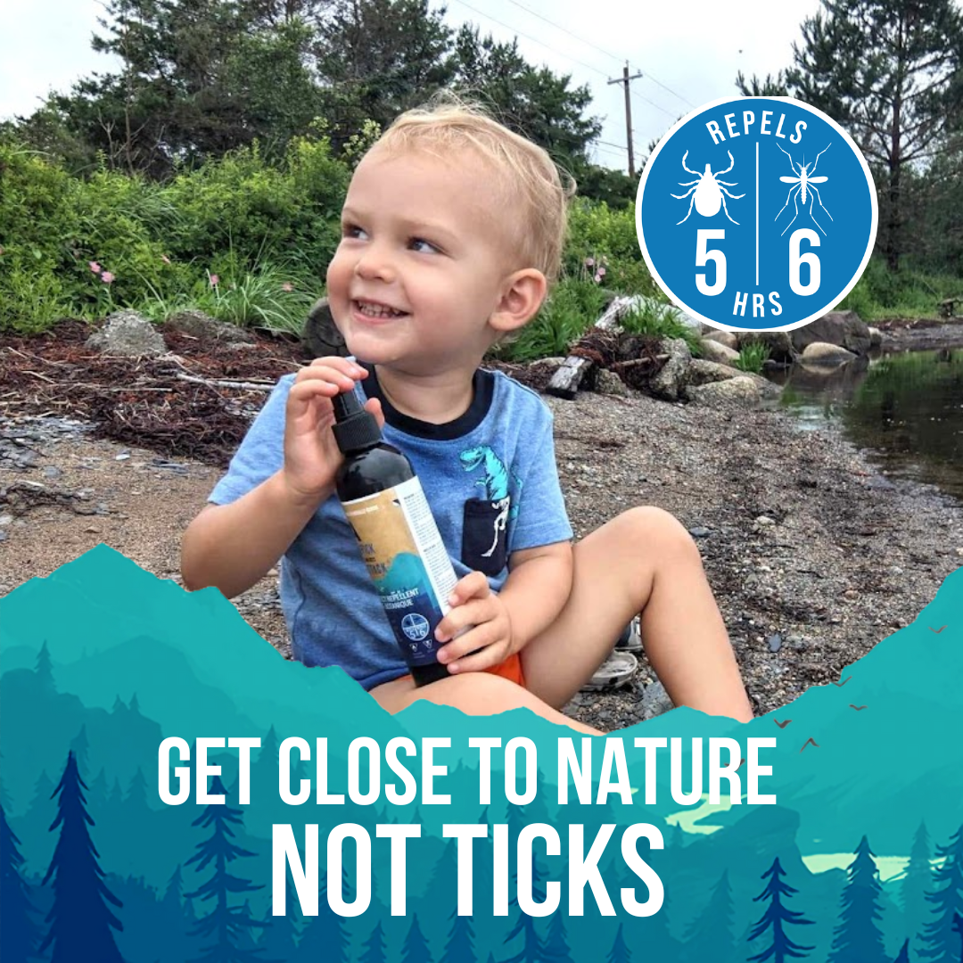 Happy toddler sitting on a sandy beach, holding a Tick Attack™ bottle, with greenery and water in the background. Features a "Repels 5-6 Hours" badge, emphasizing long-lasting, family-safe protection.