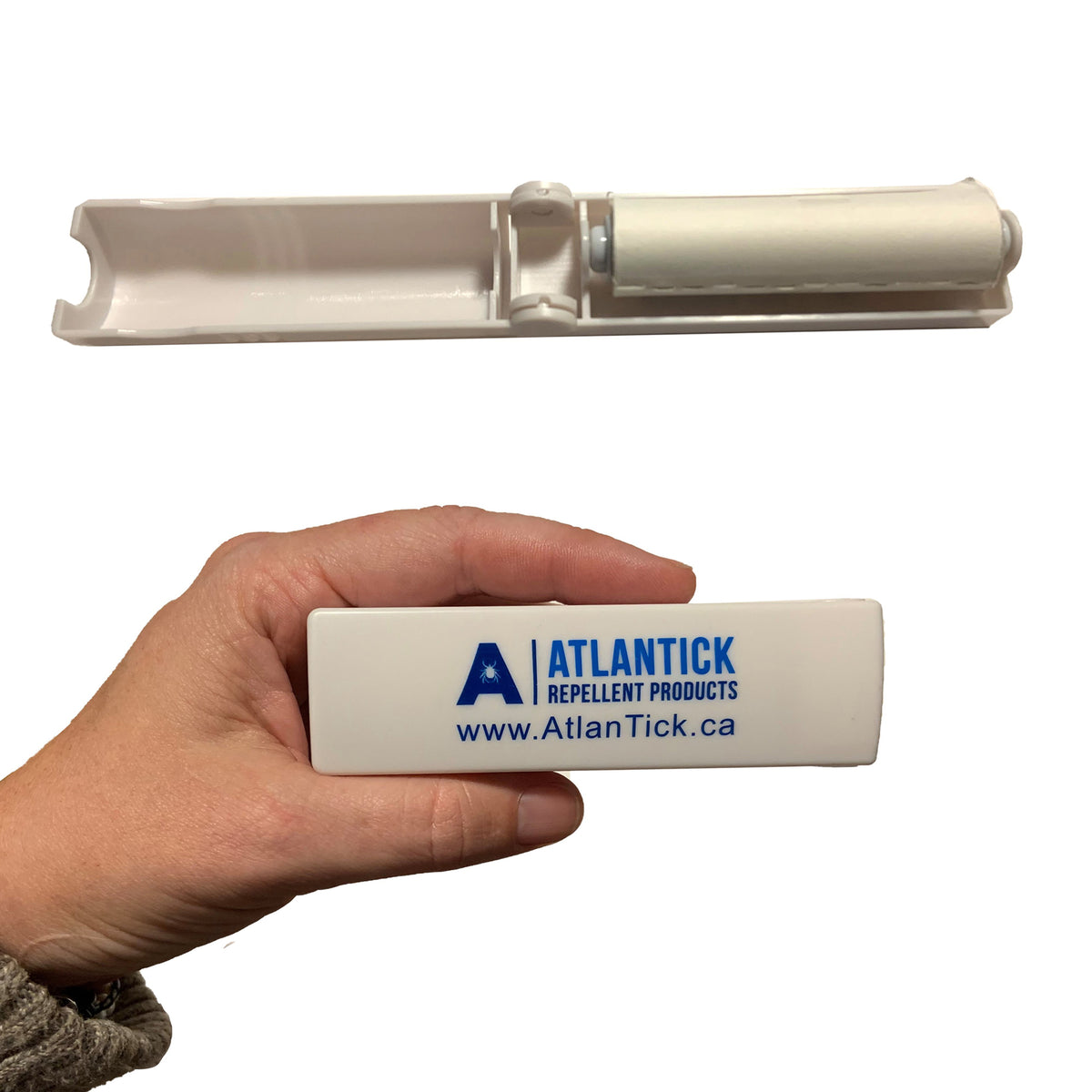 A compact AtlanTick Sticky Roller shown in both closed and open positions. The roller, designed for quick and easy tick removal, features a white protective case with the AtlanTick logo and website. A hand holding the roller demonstrates its portable, travel-friendly size.
